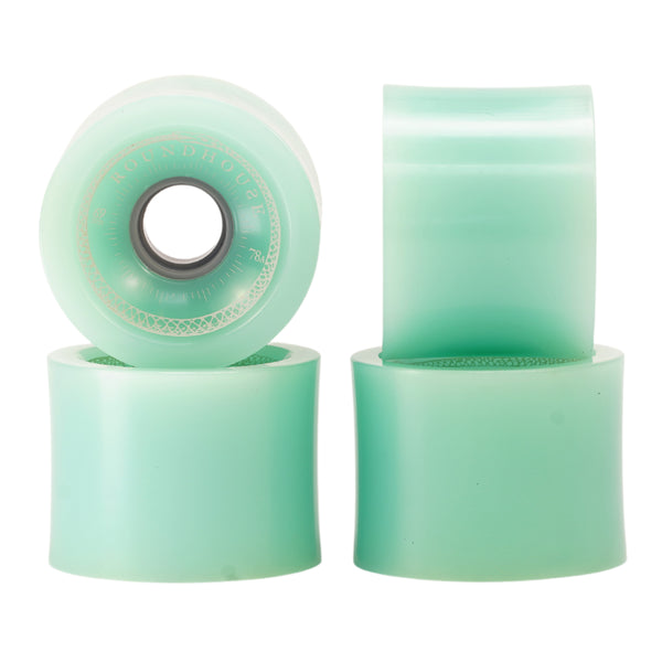 Four Carver Roundhouse Concave 69mm 78A Smoke surfskate wheels with sharp lips.