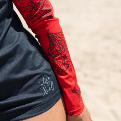 Sally Cohen in the red coral ventX long sleeve top