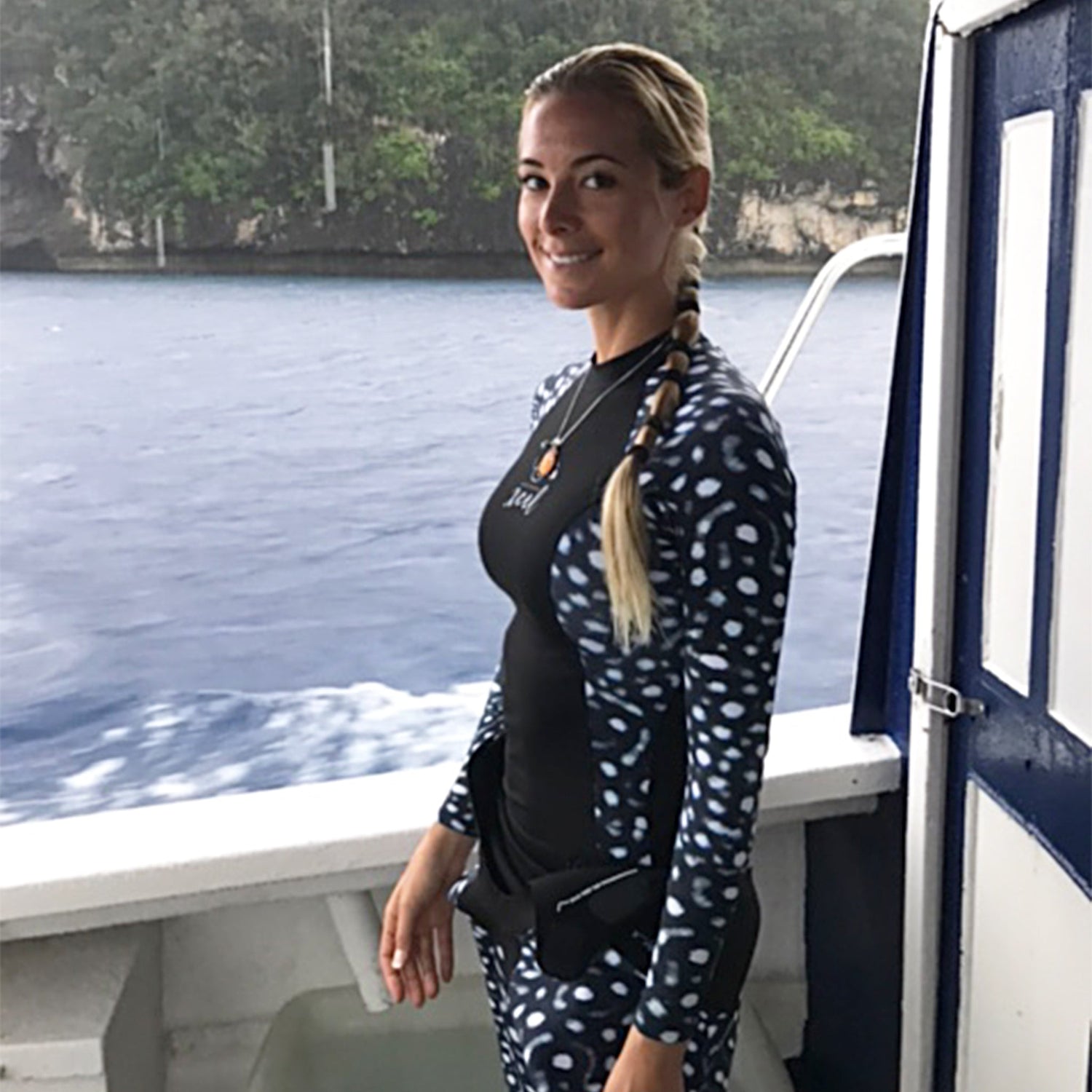 Xcel Women's Ocean Ramsey Water Inspired Premium Stretch Long Sleeve UV Top W/Key Pocket - Black/Whale Shark Print